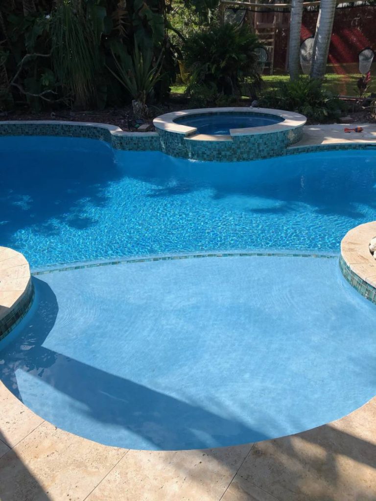 Pool tiling by Molina & Son Brick Pavers in South Florida